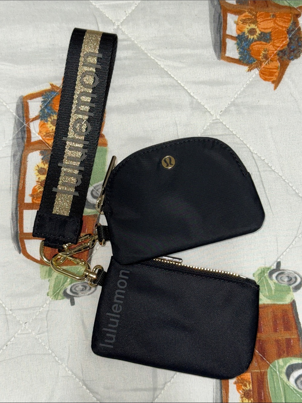 lululemon athletica Black Double Pouch Wristlet with Gold-Accent Strap